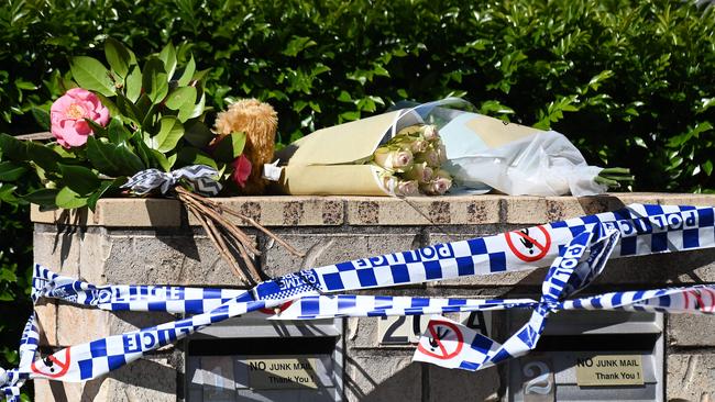Floral tributes at the Merritt St home in Harristown, Toowoomba, following the house fire which killed three children. Picture: NewsWire / John Gass