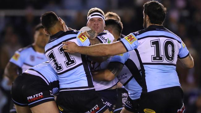 Cronulla give Josh McGuire nowhere to go. Photo: Cameron Spencer/Getty Images