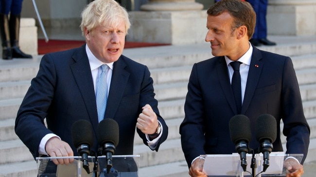 UK Prime Minister Boris Johnson and French President Emmanuel Macron have vowed to work together and with other nations to tackle people smuggling. Picture: Thierry Chesnot/Getty Images
