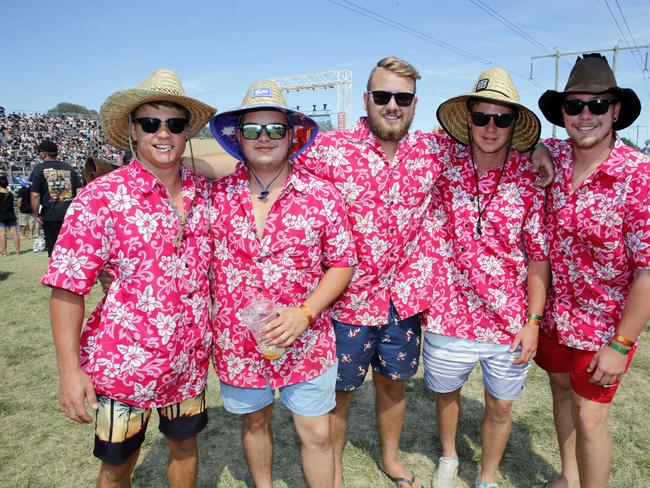 Josh Lee (24yrs), Hayden Naumann (20), Jackson Boyce (20) Lochie Hennessy (19) and Cody Boyce (21) in their Lowes Hawain shirts. The boys are all from Toowoomba QLD. They attended the Burnout competition at the festival. The annual Street Machine Summernats Car Festival began in Canberra with thousands of car enthusiasts expected to attend the event over the four days. Picture: Gary Ramage/ News Corp Australia
