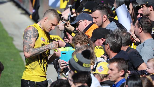 Dustin Martin signs autographs at Richmond's open training open training session at Punt Rd Oval. Picture: Alex Coppel