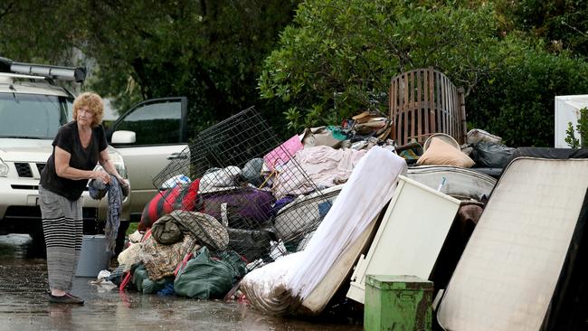 Yvonne Burt tries to salvage some of her belongings. Nathan Edwards