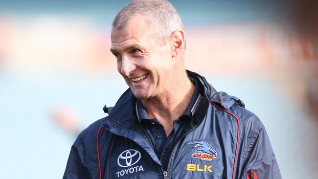 Walsh made his players swim to the end of Brighton Jetty in the dark in Round 4, 2015, but also hopped in and did the swim himself. Picture: Morne de Klerk (Getty).