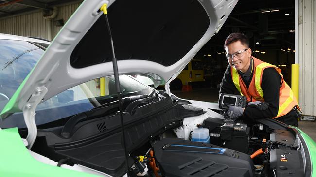 RAA Road Service Patrol mechanic Marc Casanova with RAA's first electric vehicle, a Hyundai Kona. Picture: Mark Brake