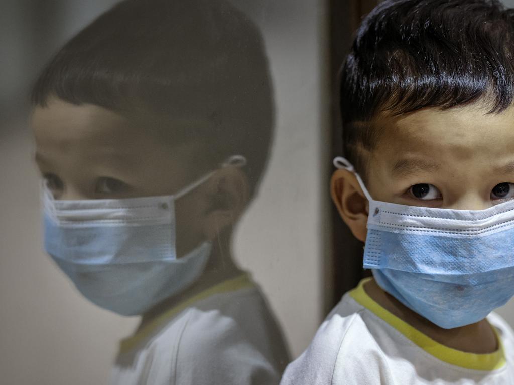 A child is seen wearing a facemask, as public fear over China's Wuhan Coronavirus grows, at the Ninoy Aquino International Airport in Manila, Philippines. Picture: Ezra Acayan/Getty Images