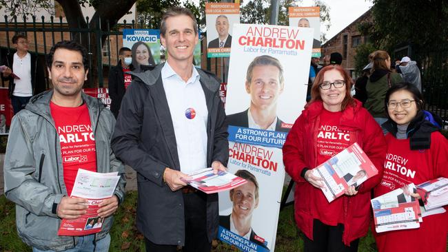 Labor candidate Andrew Charlton surrounded by volunteers including Granville MP Julia Finn at the Granville Public School. Picture: Brendan Read