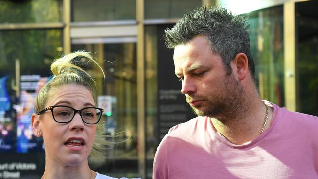 Dee and Jay Windross speak to media outside the County Court. Picture: AAP