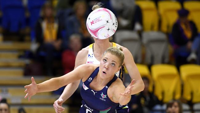 Vixens co-captain Kate Moloney reaches out for the ball. Picture: Albert Perez/Getty Images