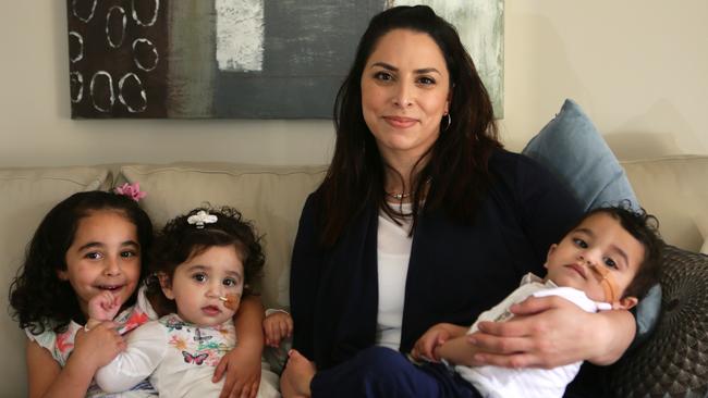 Mum Julie Gravina pictured with children Amelia, Charlize and Isaac, who died on January 23.