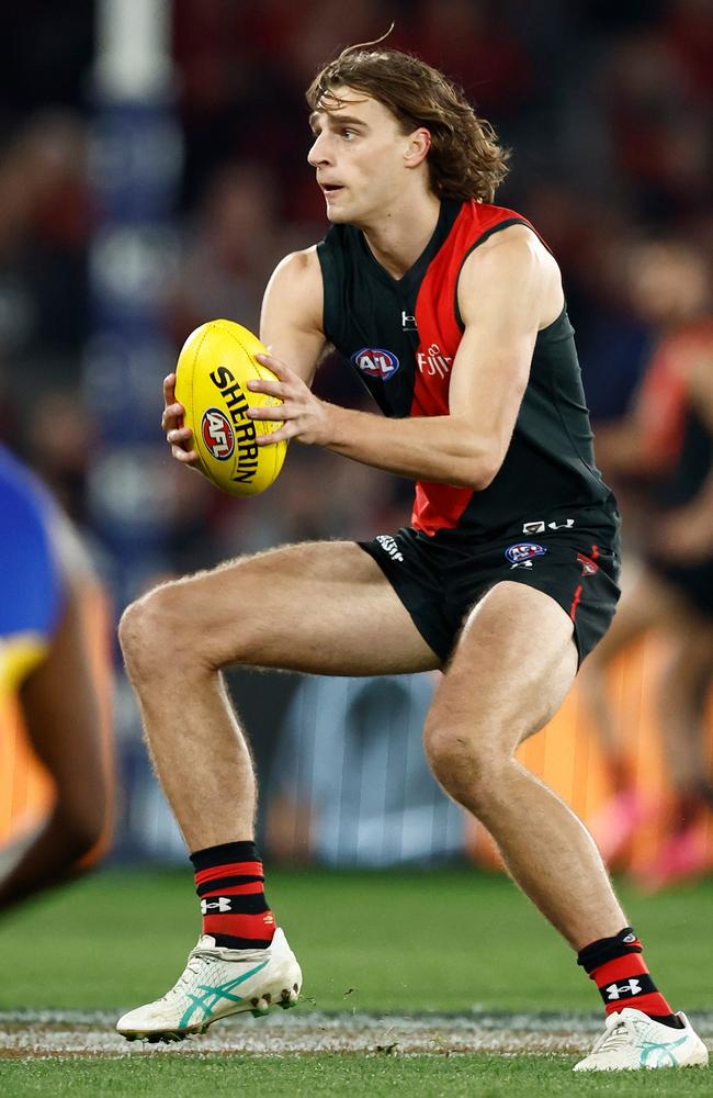 Essendon coach Brad Scott says he will continue to trial players in different positions over the next month after being pleased with moves including Harry Jones (pictured) to a wing and Nick Hind to half-forward. Picture: Michael Willson / Getty Images