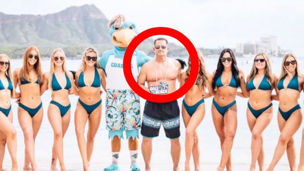 Coastal Carolina University football coach Tim Beck has addressed a since-deleted photo that showed him posing shirtless alongside the school’s bikini-clad dance team while on the beach in Hawaii for the EasyPost Hawai’i Bowl this week.