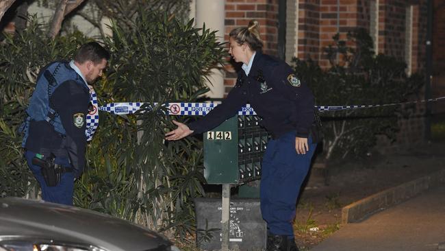 Police established a crime scene outside the apartments. Picture: Gordon McComiskie