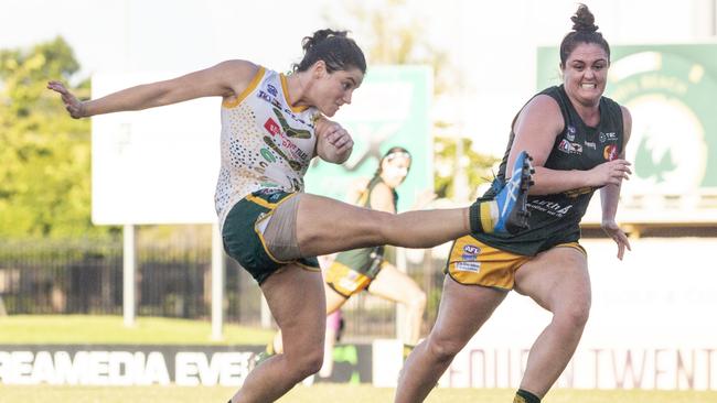 PINT player Amy Chittick kicks the ball during the NTFL prelim final. Picture: Floss Adams.