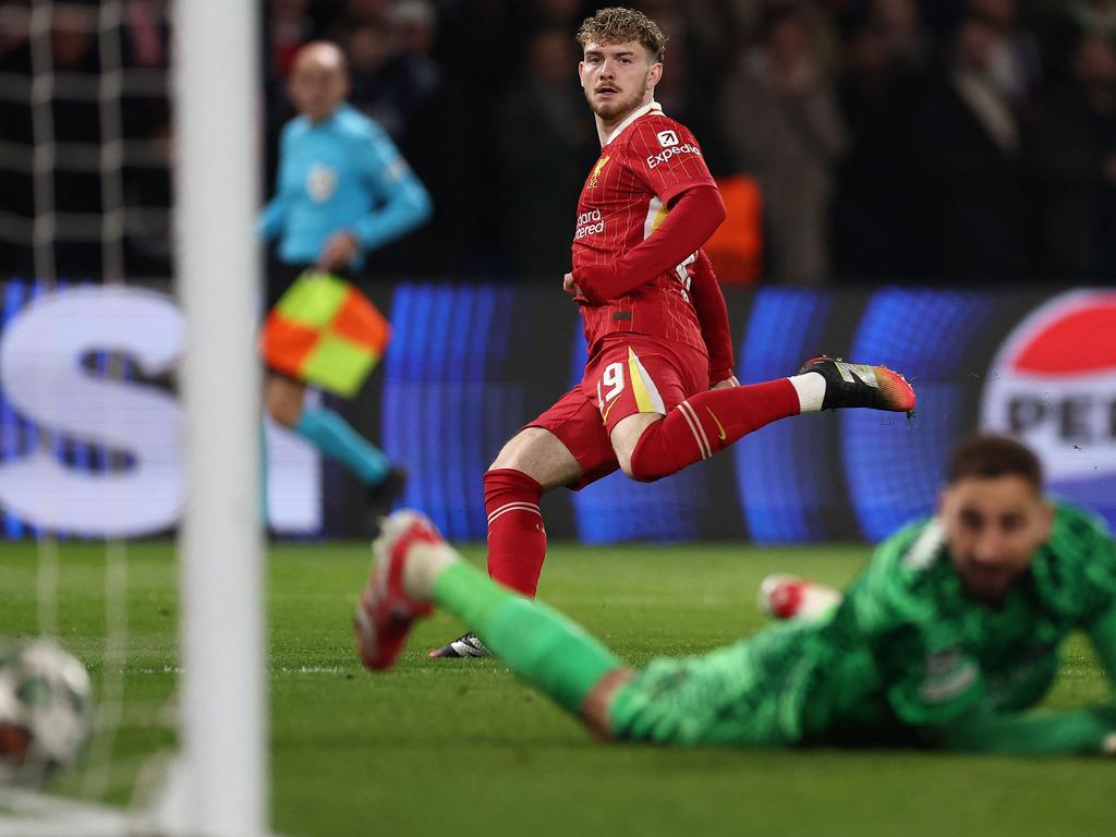 Harvey Elliott (left) watches as the ball passes Paris Saint-Germain goalkeeper Gianluigi Donnarumma. Picture: AFP