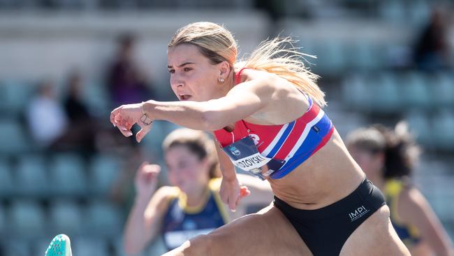 Delta Amidzovski from Corpus Christi winning the girls 16 years 100m hurdles with a meet record at the 2022 NSW All Schools.