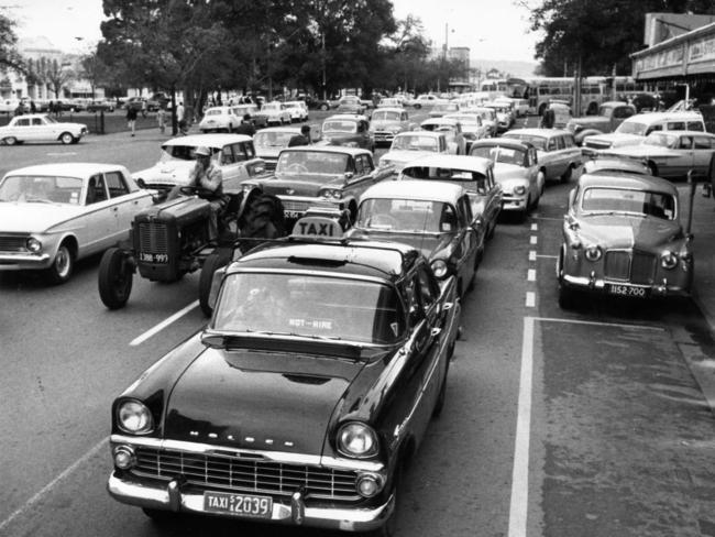 A tractor sits in a traffic jam on Pulteney Street in 1965.