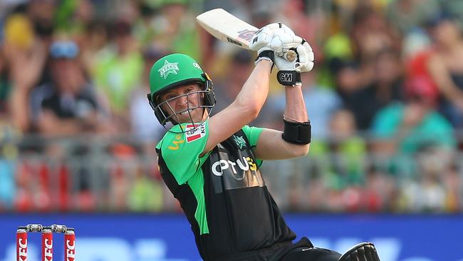 Nick Larkin hammers a drive through cover during his half-century against Sydney Thunder.