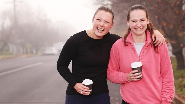 Gather to run and grab a coffee before work as a social activity – Zali Thomas with Harriet Spork and Kelpie Eddie. Picture: Rohan Kelly