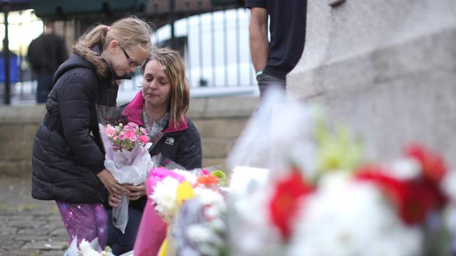 People lay floral tributes in Market Square in memory of Jo Cox, 41, Labour MP for Batley and Spen. Picture: Getty