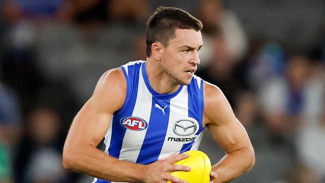 MELBOURNE, AUSTRALIA - MARCH 23: Luke Davies-Uniacke of the Kangaroos in action during the 2024 AFL Round 2 match between the North Melbourne Kangaroos and the Fremantle Dockers on March 23, 2024 in Melbourne, Australia. (Photo by Dylan Burns/AFL Photos via Getty Images)