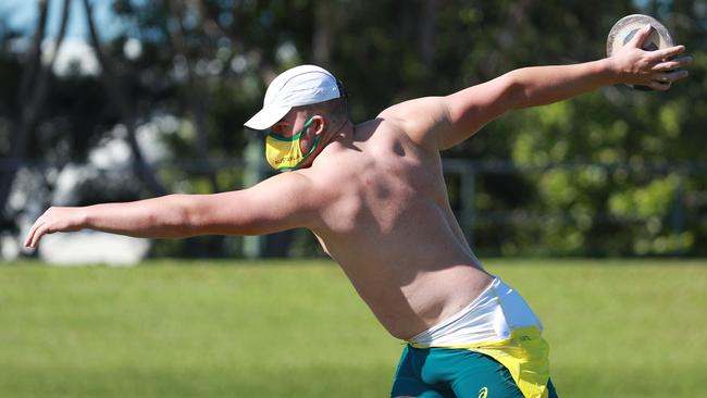 LOCAL CAMPION: Discus thrower Matt Denny warms up before training - The Australian Athletics Olympic team train at Barlow Park before departing Cairns for the Tokyo Olympic Games. Picture: Brendan Radke