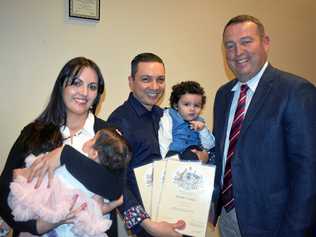 NEW AUSTRALIANS: Mayor Tyson Golder stands with Luz Perez and Cesar Sabogal and their children, Alana and Matias, at the Roma citizenship ceremony. Picture: Joshua Macree