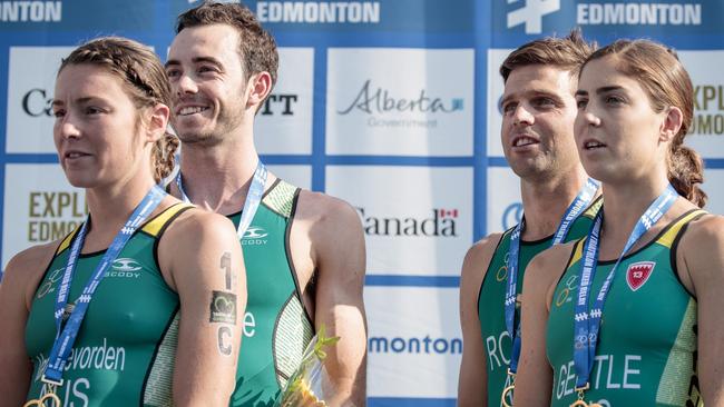 Natalie Van Coevorden, left, with Australian mixed relay teammates Jake Birtwhistle, Aaron Royle and Ash Gentle.