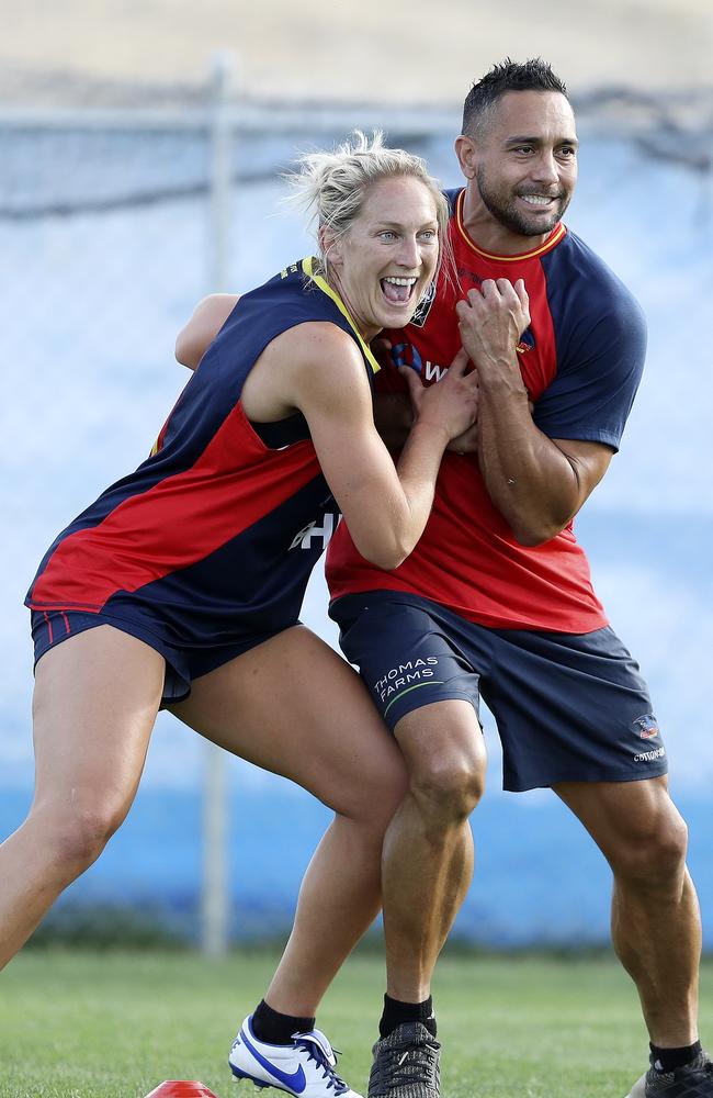 Marijana Rajcic and McLeod at training, where he has helped mentor and coach the Crows’ women’s team. Picture: Sarah Reed