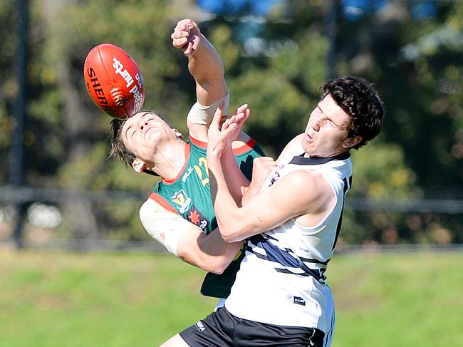 Tyrone Leonardis collides with Tasmania’s Mitch Hibberd during his time at Northern Knights. Picture: Josie Hayden