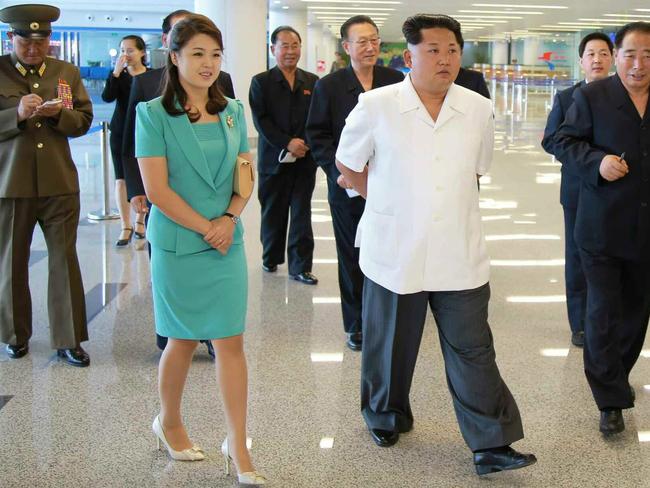 North Korean leader Kim Jong-un with his wife Ri Sol-ju at Pyongyang International Airport. Picture: EPA/Rodong Sinmun