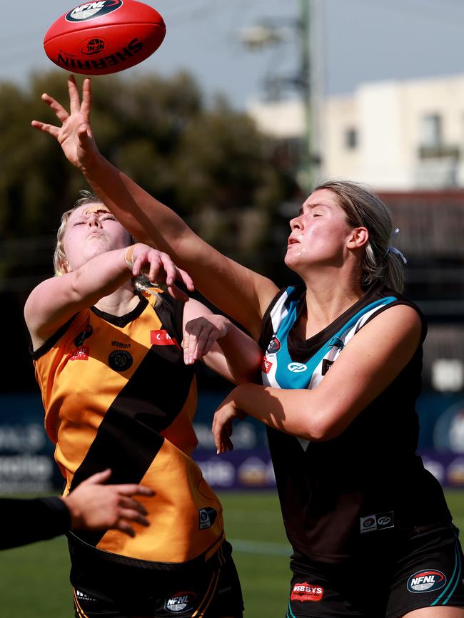 Heidelberg’s Ella Norris battles Georgia Kitchell of St Mary's. Picture: Hamish Blair