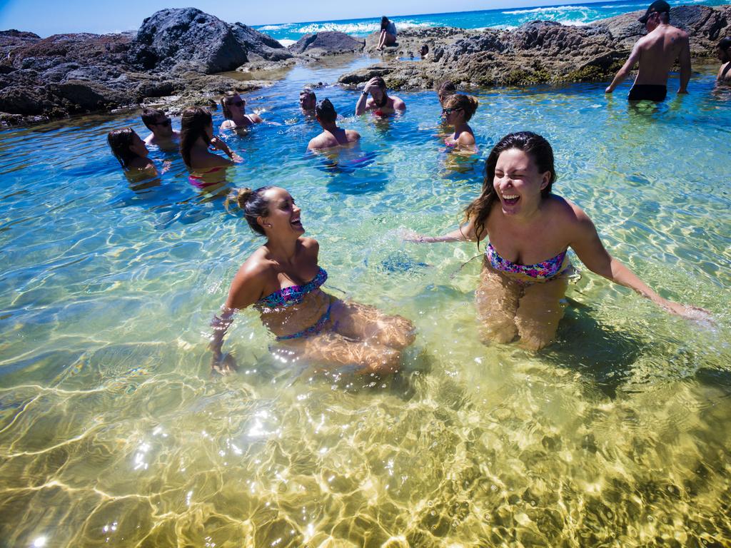 <b>CHAMPAGNE POOLS, FRASER ISLAND, QUEENSLAND: </b>Like most of the Queensland coastline, Fraser Island is blessed with great spots to swim. The stunningly beautiful freshwater Lake Mackenzie, with its brilliant white sand is, understandably, the island’s most popular drawcard. But for a dip that’s a little different, venture to the northern end of the 75 Mile Beach to discover the Champagne Pools. Named for the way the foam fizzes as the ocean crashes in, the naturally formed volcanic rock pools are a unique spot to experience a dip on a beach that’s otherwise off-limits for swimmers. Cheers! <a href="http://www.visitfrasercoast.com/" target="_blank">visitfrasercoast.com</a> Picture: Glenn Hunt