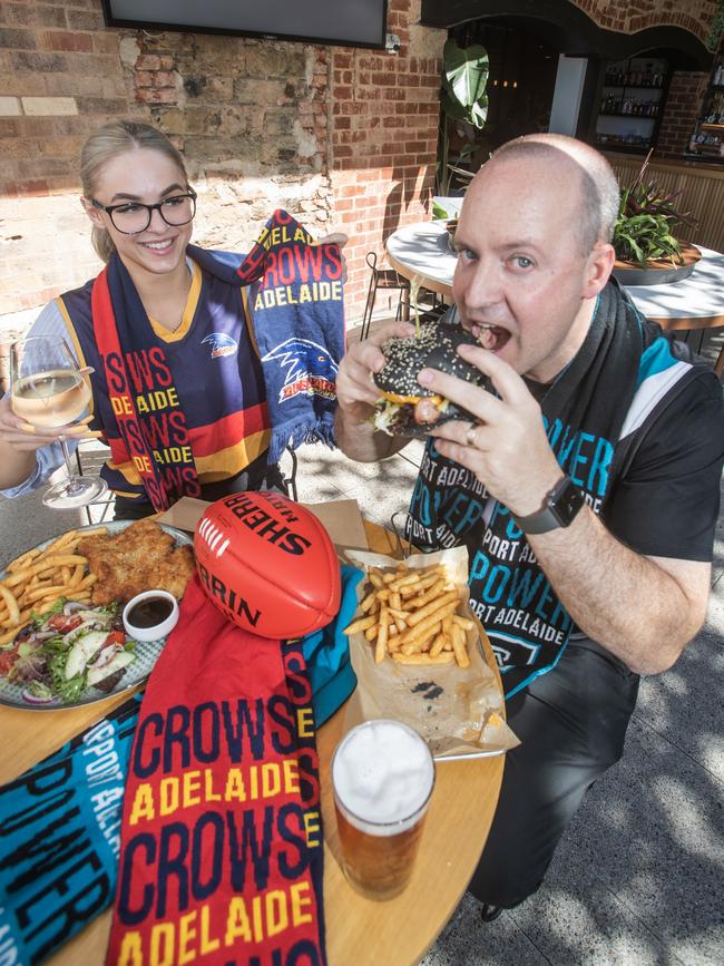 Footy fans Lauren Green and Tim Riemann at the Strathmore Hotel. Picture: Simon Cross