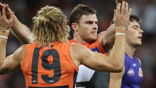 Giants Heath Shaw celebrates after kicking a goal with Giants Nick Haynes during AFL Preliminary Final match GWS Giants v Western Bulldogs at Spotless Stadium. Picture. Phil Hillyard