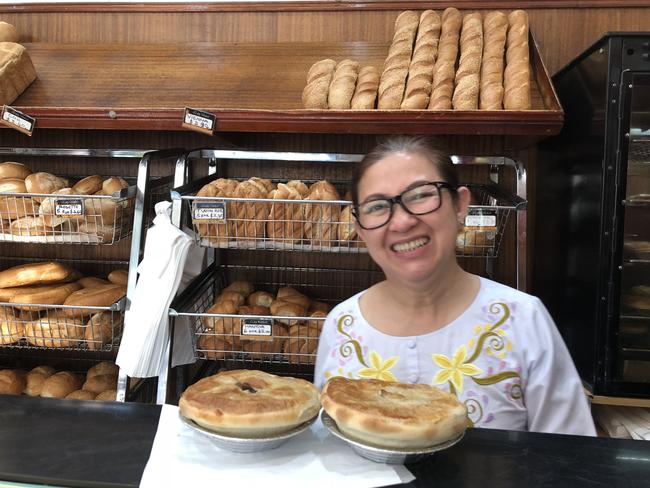 Pendle Way Bakery in Pendle Hill's Hang Phan at 7.27am. Hang awakes way before the crack of dawn preparing to serve her customers — always with a smile. Picture: Joanne Vella