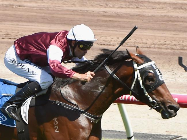 MELBOURNE, AUSTRALIA - JANUARY 16: Dwayne Dunn riding Hellbent defeats Craig Williams riding Mossin ' Around in Race 6, Inglis Dash during Melbourne Racing at Flemington Racecourse on January 16, 2016 in Melbourne, Australia. (Photo by Vince Caligiuri/Getty Images)