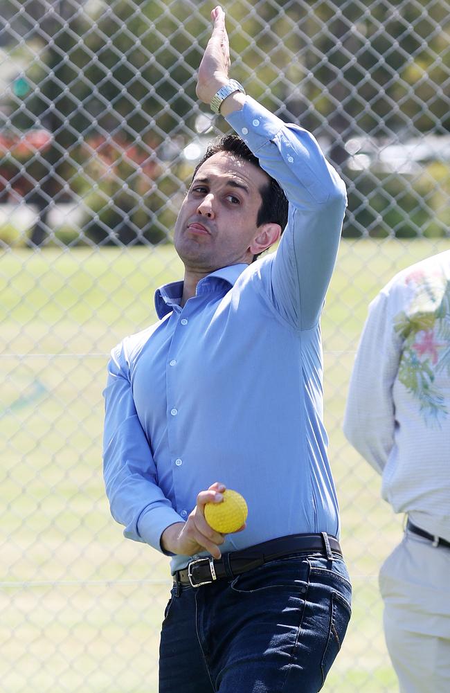 Premier David Crisafulli, seen here on this year’s campaign trail, is mad about cricket.