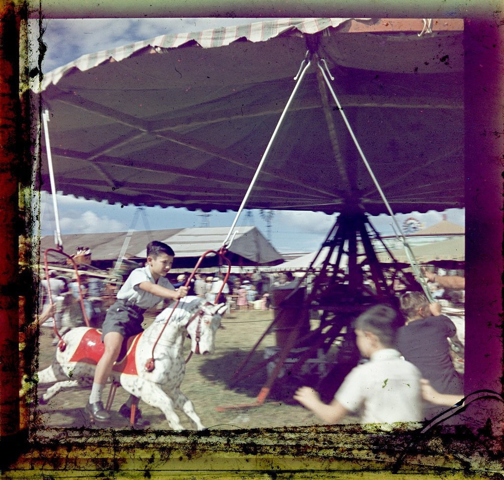 This photo is from 1958 and is of children enjoying the merry-go-round/carousel ride at Carnival of Flowers celebrations.Local History and Robinson Collection, Toowoomba City Library.