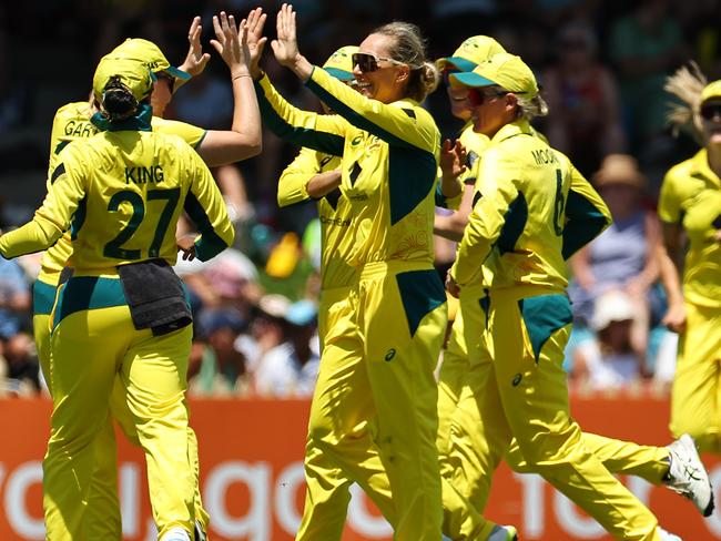 Ash Gardner celebrates one of her three wickets. Photo: by Jeremy Ng/Getty Images.