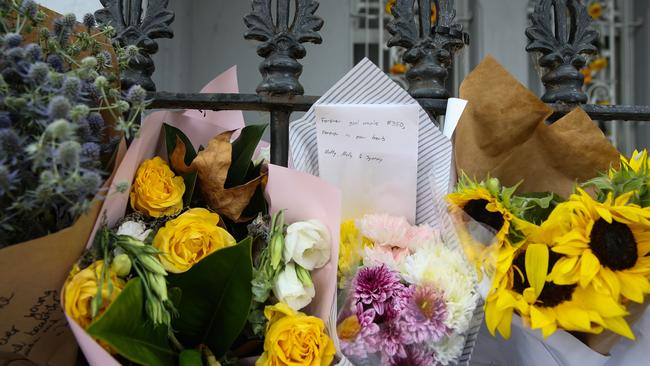 People have laid flowers in tribute to TV Presenter Jesse Baird and Qantas Flight crew member Luke Davies after Mr Baird’s former partner Beau Lamarre-Condon, a serving NSW Police officer, was charged with two counts of murder. Picture: NCA NewsWire / Gaye Gerard