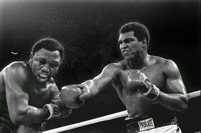 Then heavyweight champion Muhammad Ali connects with a right in the ninth round of his title fight against Joe Frazier in Manila, Philippines, Oct. 1, 1975. Ali won the fight on a decision to retain the title. . Picture: Mitsunori Chigita