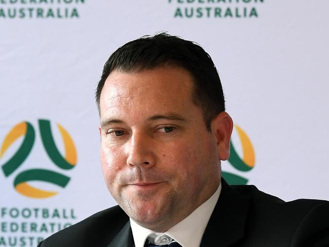 Football Federation Australia (FFA) Chief Executive Officer James Johnson speaks to the media during a press conference in Sydney, Tuesday, March 24, 2020. (AAP Image/Joel Carrett) NO ARCHIVING