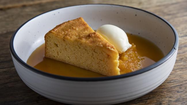 Warm orange and almond cake from Pitchfork is available to dine-in or as takeaway. Picture: Mark Cranitch.