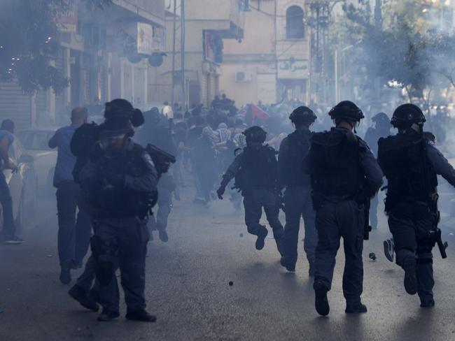 Israeli riot police at a protest against Israel's military offensive on the Gaza Strip, in the northern city of Nazareth, on July 21. AFP PHOTO/AHMAD GHARABLI