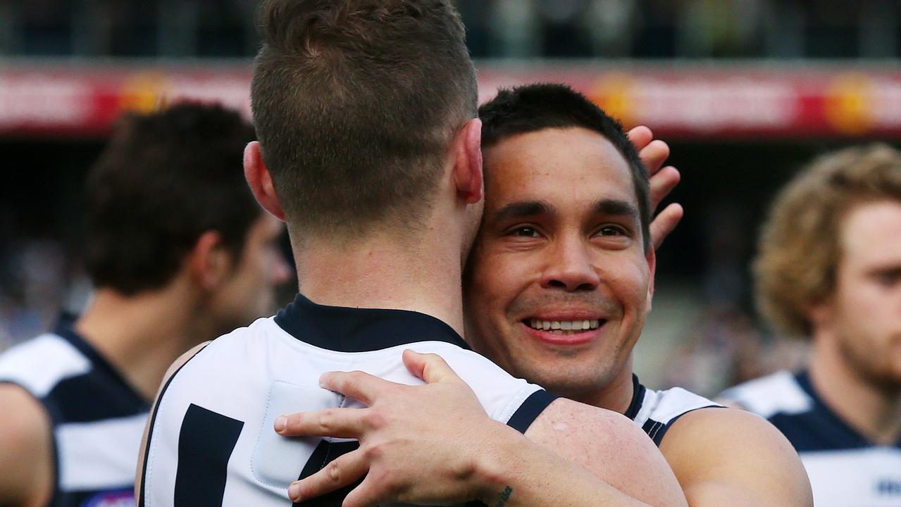 Mathew Stokes hugs teammate Joel Selwood in 2015. Stokes says Selwood would have a look in his eyes that meant he would carry the team to victory. Picture: Colleen Petch