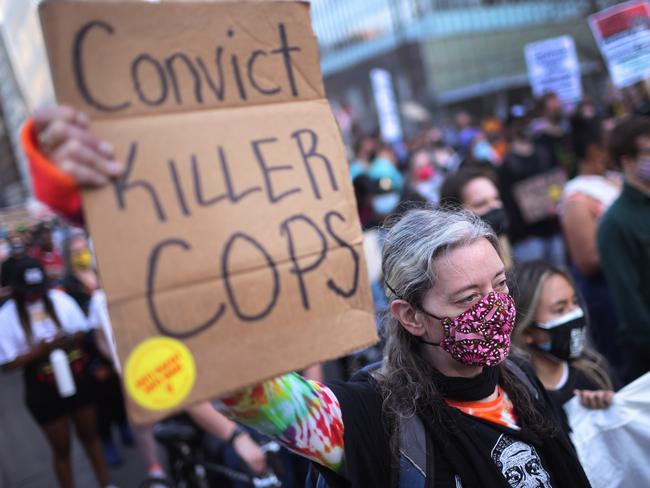 Activists demonstrate near the court. Picture: Getty Images/AFP