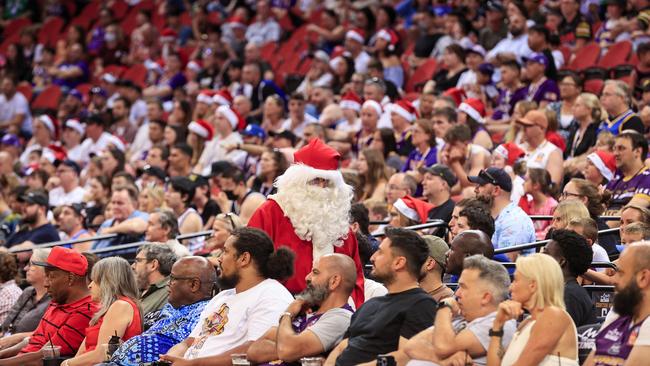 Santa makes his way through the crowd during the match between Sydney Kings and Melbourne United last Christmas. Picture: Getty Images