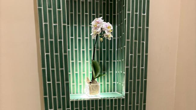 A floral display in a toilet at Anantara Mai Khao Phuket Villas.