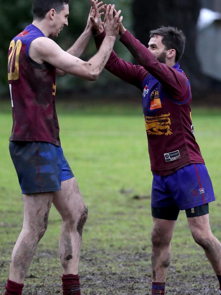 South Yarra and Hallam do battle in the mud in Southern Football League Division 4.