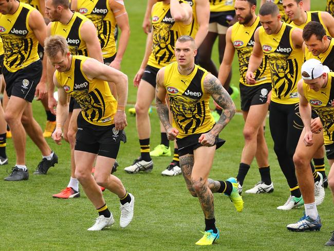 Dustin Martin of the Tigers runs with his teammates during a Richmond Tigers AFL training session at Punt Road Oval. Picture: Scott Barbour/Getty Images